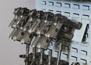 pistol storage rack on gun wall