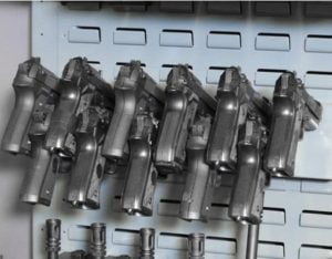 pistol storage rack on gun wall